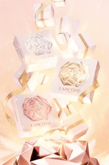 Alt text: A pink, glittering background features sparkling ribbons and small gift boxes with a rose logo, creating an elegant and festive atmosphere.