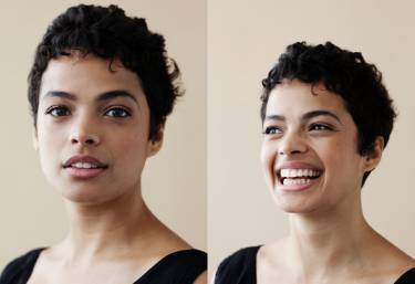 A close-up portrait of a person with short, curly hair, showing two expressions: a calm smile on the left and a broad smile on the right, against a light beige background.