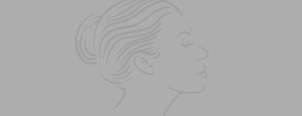 An outline of a woman's profile against a light gray background, featuring smooth lines and an elegant hairstyle.