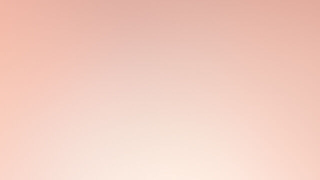 A close-up of a Lancome Nutrix Royal Body cream jar against a soft pink background. The jar features a gold lid and elegant branding.