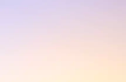 A close-up view of various smooth, glossy paint strokes in shades of white, pink, and light blue on a light gray background.
