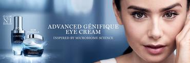A promotional image featuring Lancome’s Advanced Genifique Eye Cream and serum, highlighting the new formula inspired by microbiome science, with a woman showcasing healthy skin.