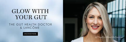 A smiling woman with long, light-colored hair stands against a blurred background, promoting gut health with the text "Glow with Your Gut" and branding for The Gut Health Doctor and Lancome.