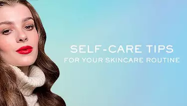 A woman with long, wavy brown hair, bold red lipstick, and a neutral-toned turtleneck is featured on the left, looking confidently forward. The background is a soft blue gradient, with text on the right that reads "SELF-CARE TIPS FOR YOUR SKINCARE ROUTINE."