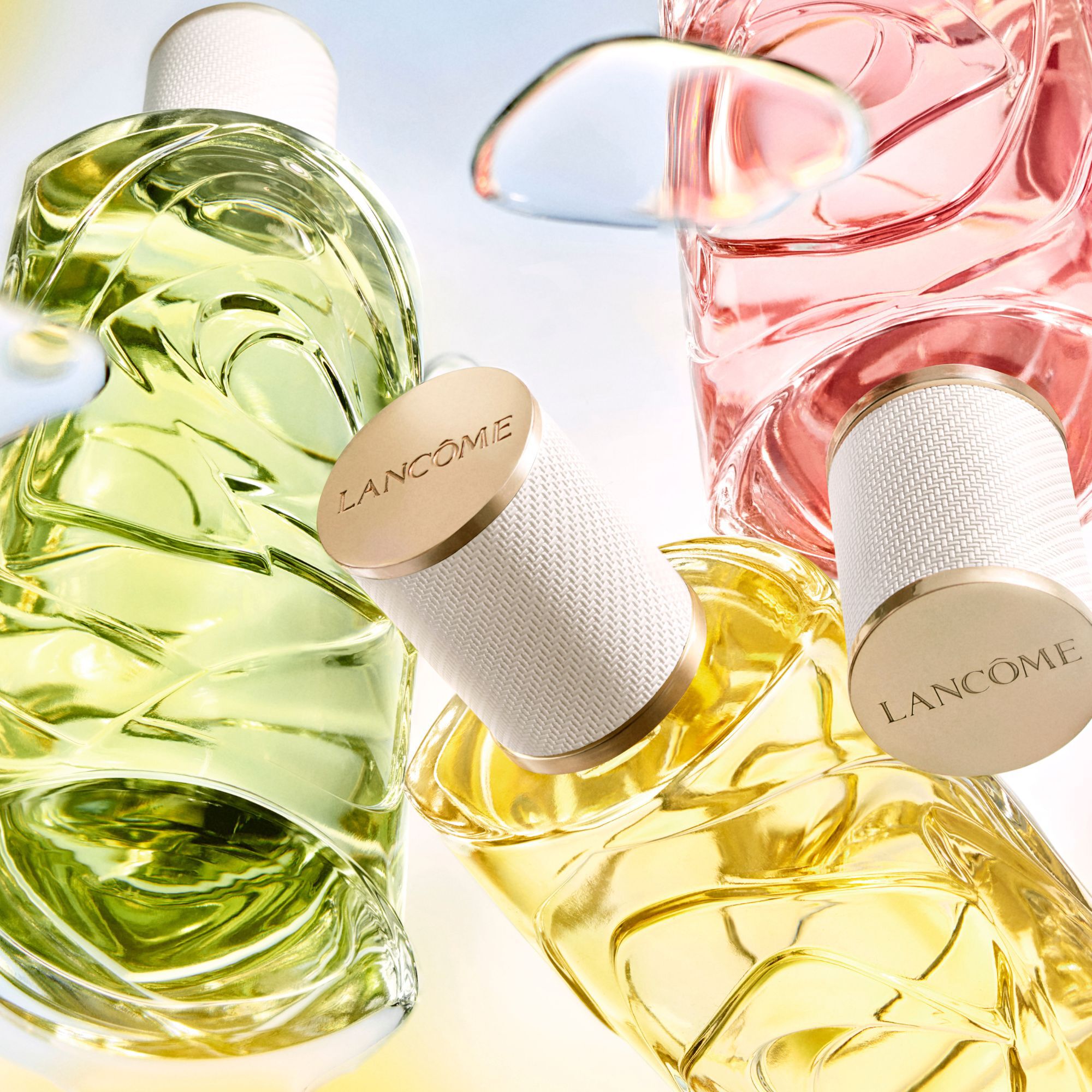 Lancome's new perfume collection features a dreamy blend of floral and fruity notes in elegant packaging.