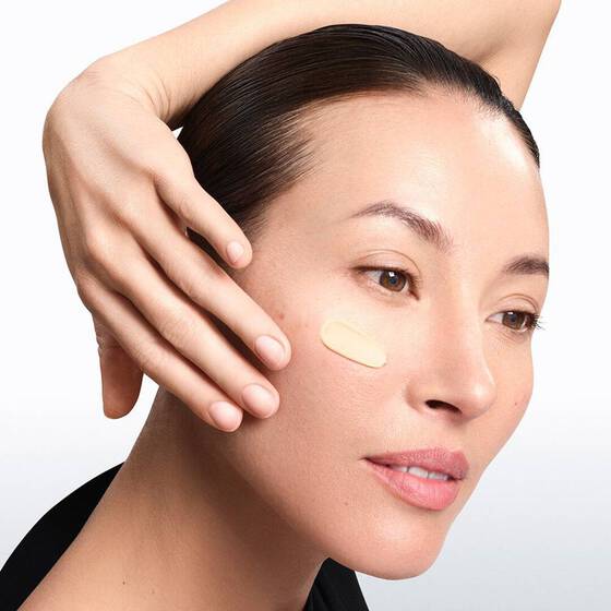 close-up of a woman showcasing her 30s skincare routine